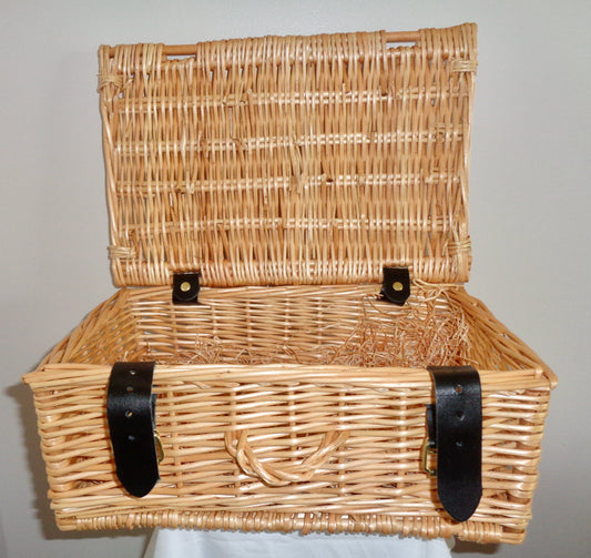 Small Wicker Picnic Basket With Brown Leather Closure Straps And Wicker Handle