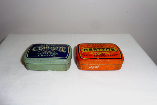 Pair of 1920s Herzite/Cymosite Radio Detector Crystal Tins With Crystals