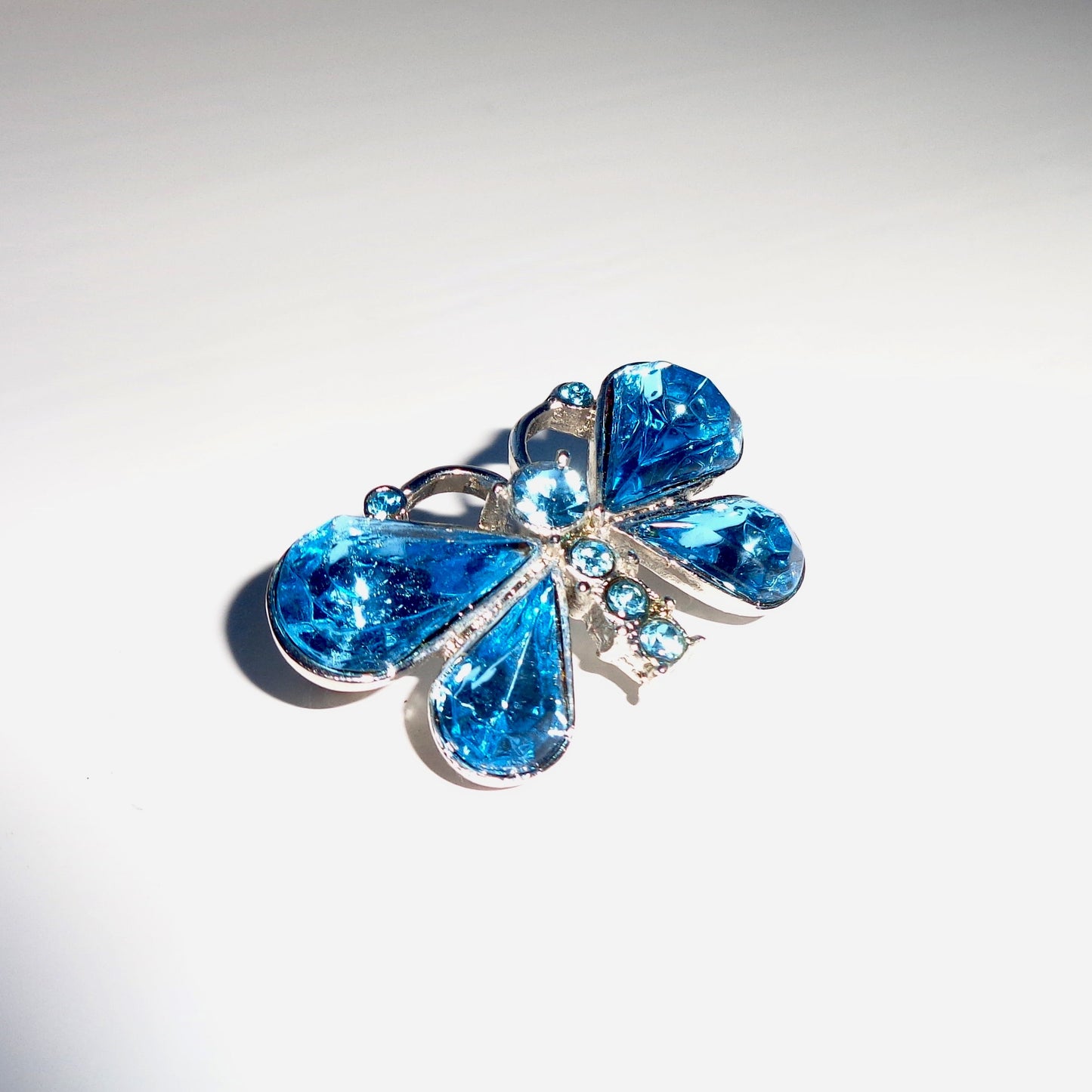 Vintage Butterfly Brooch In Silver Coloured Metal And Blue Glass Accents