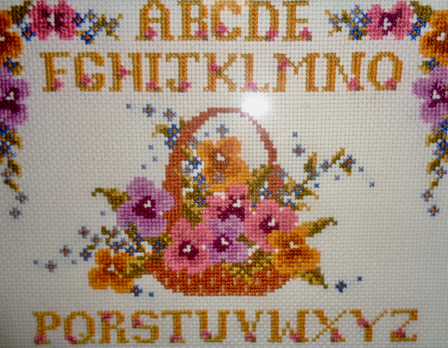 Framed Completed Floral Alphabet Cross Stitch Sampler