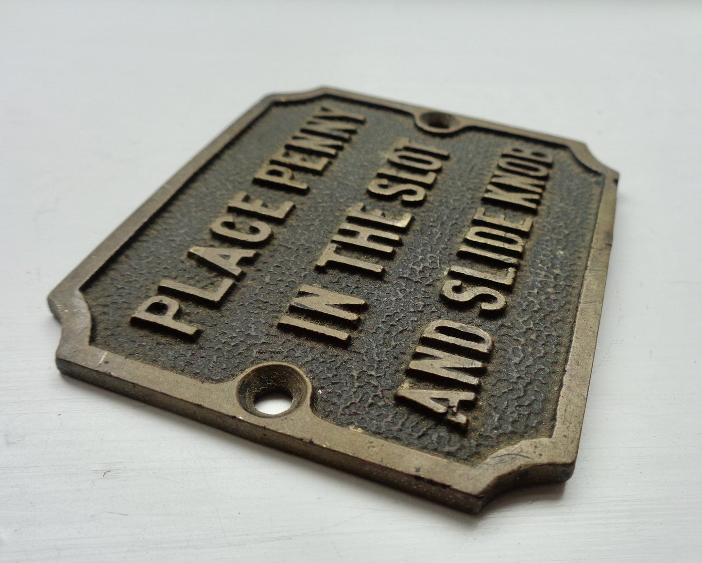 Vintage Brass Instruction Sign To Place Penny In The Slot and Slide Knob