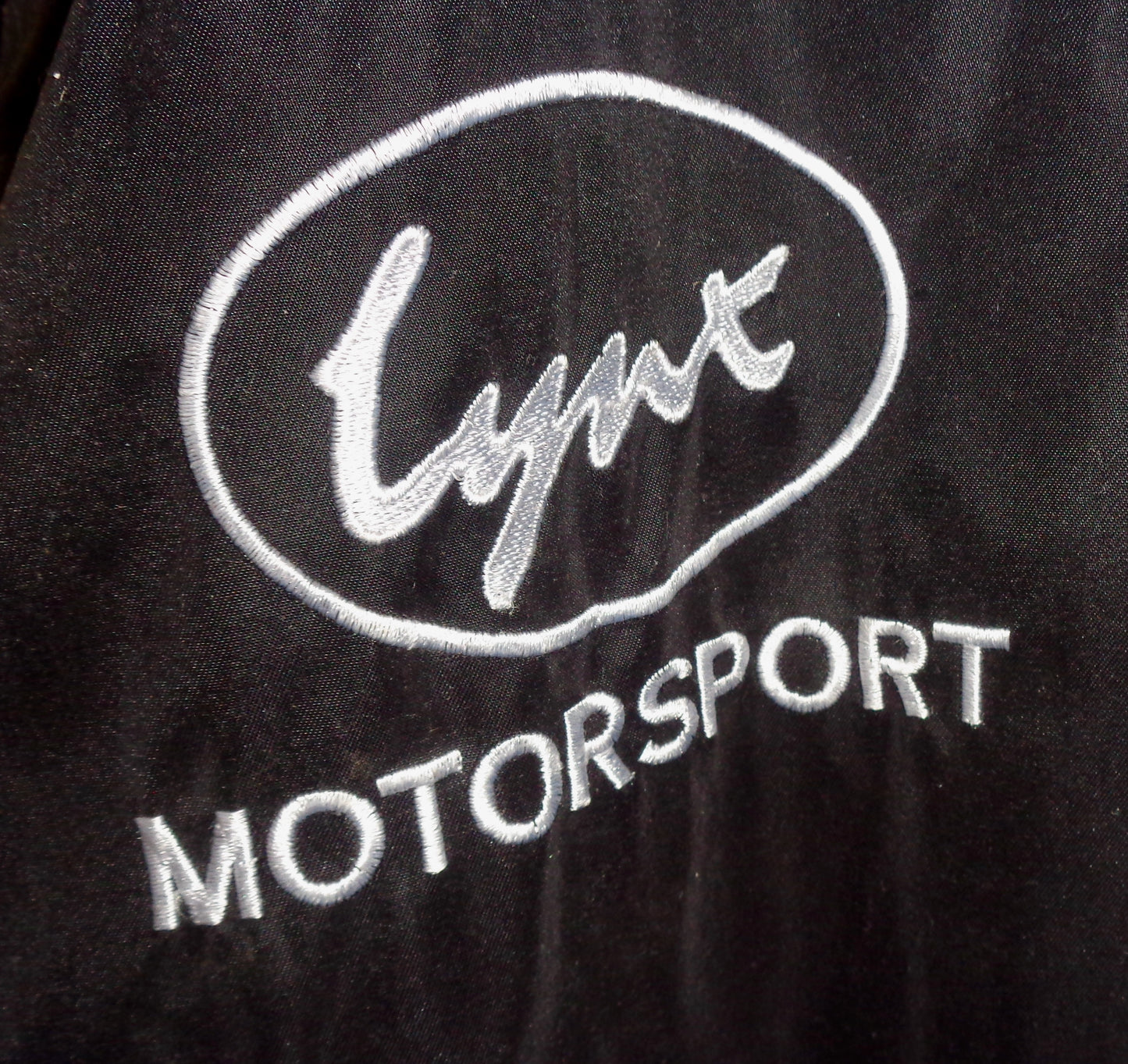 XL Lynx Jaguar Motorsport UK Black Padded Jacket With White Lynx Logo and Reflective Strips