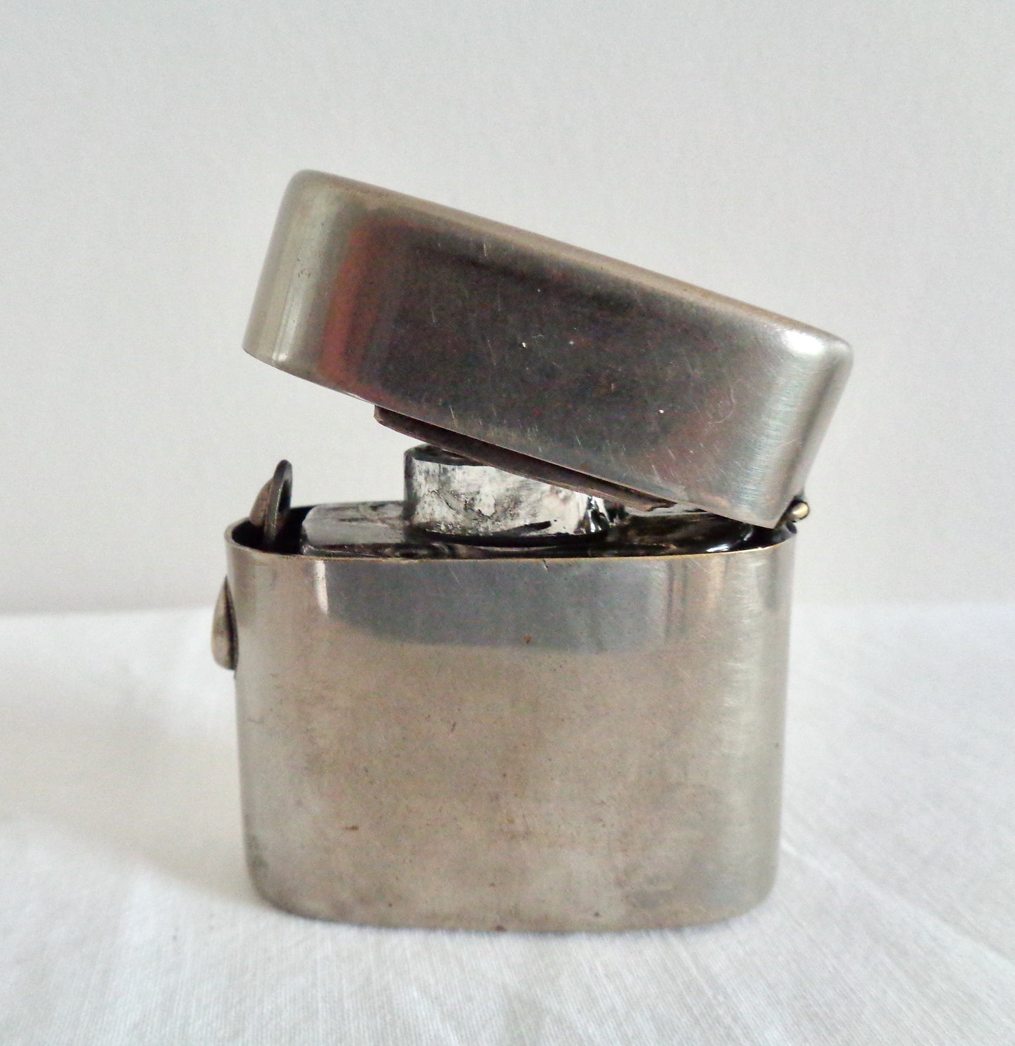 Boer War Metal Lighter Shaped Travelling Inkwell With Glass Insert
