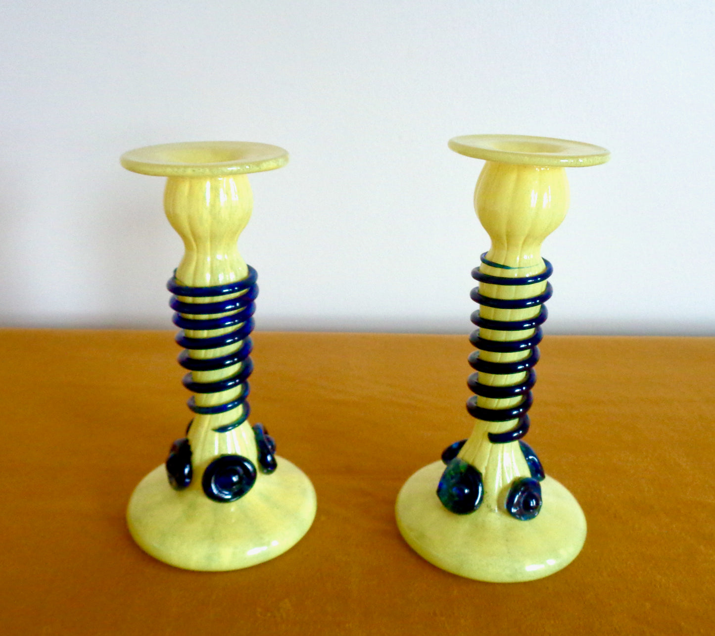 Pair Of Yellow Art Glass Candlesticks With Blue Spiral Glass And Flower Accents