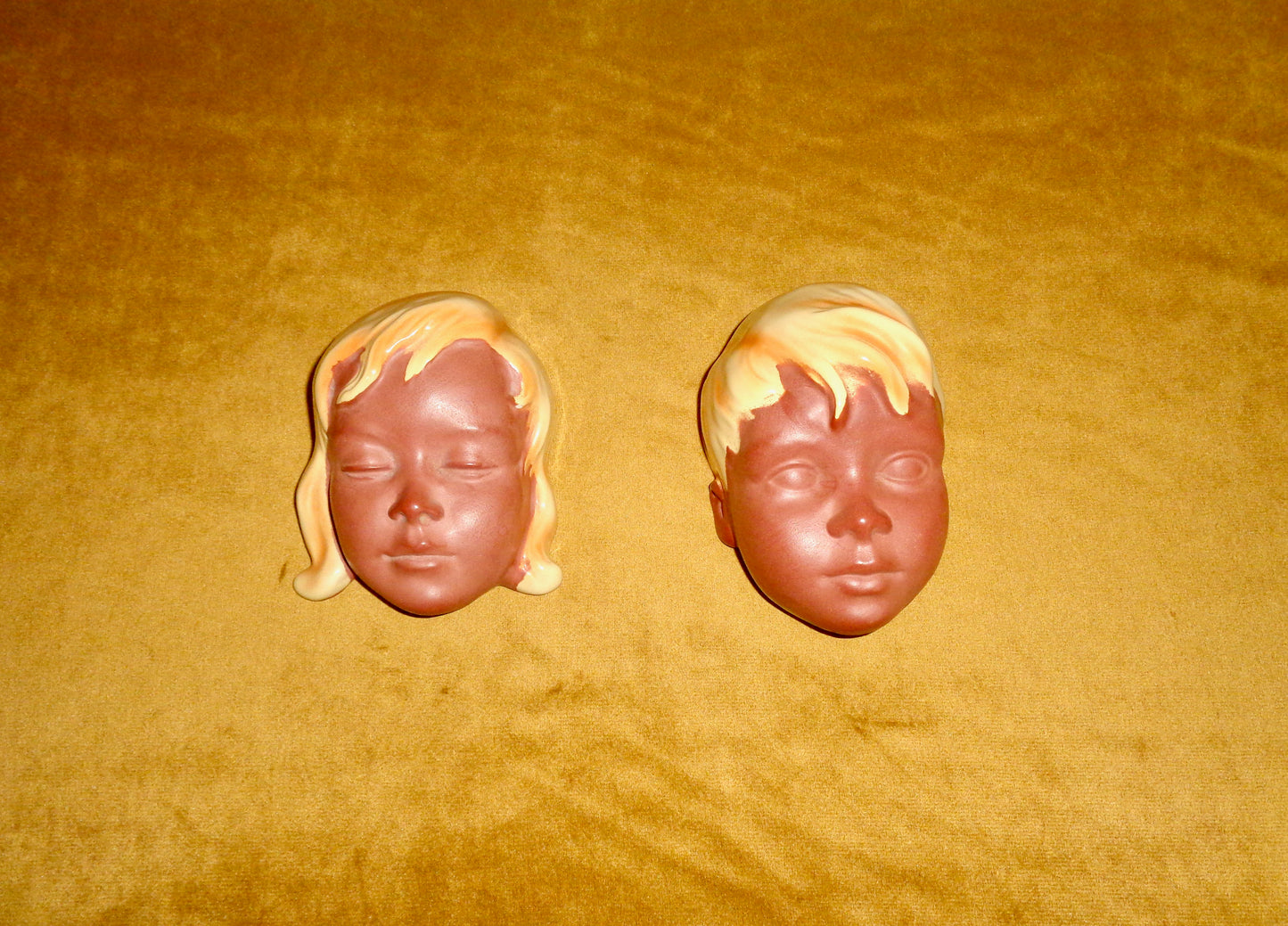 Pair Of 1960s German Cortendorf Wall Masks Comprising A Boy And Girl
