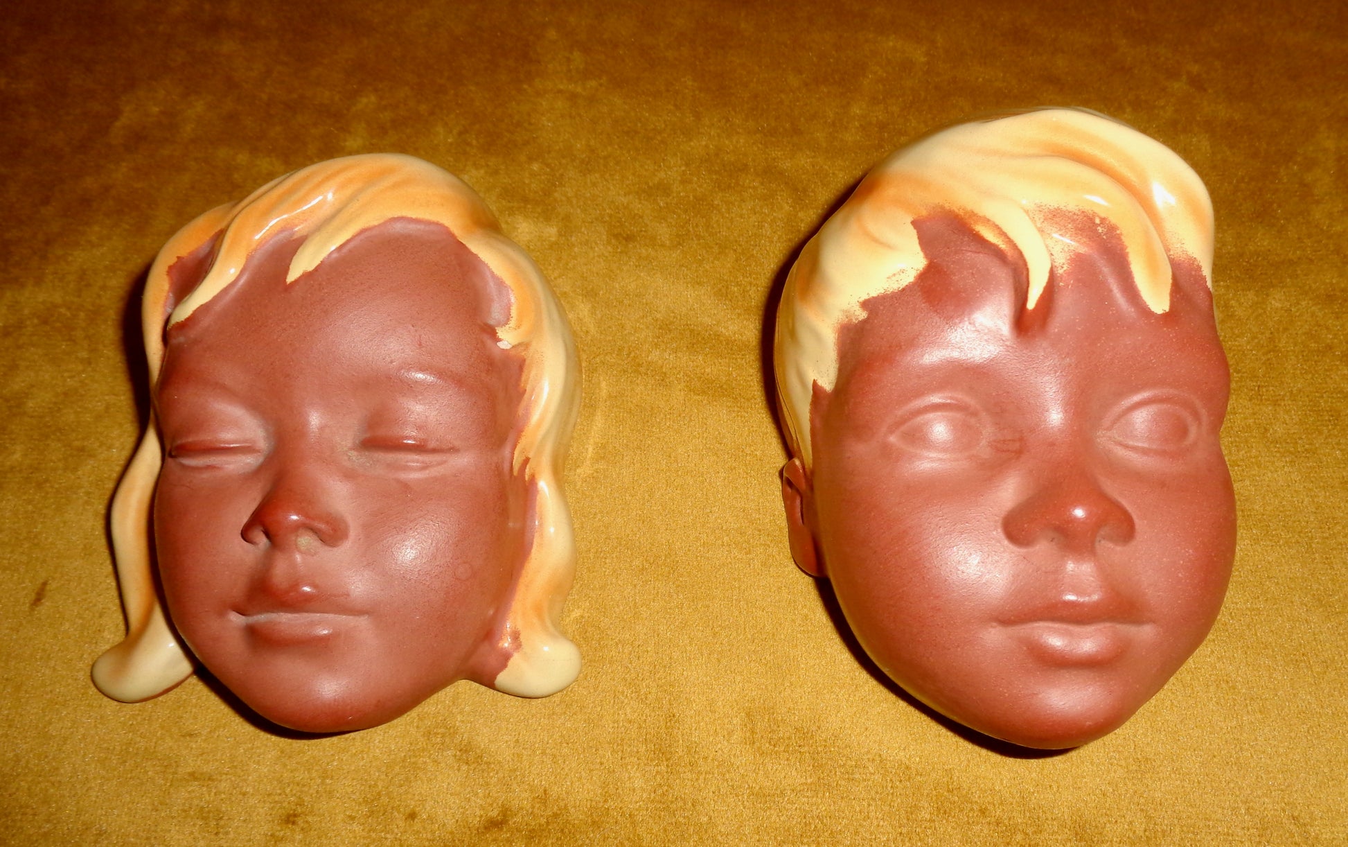 Pair Of 1960s German Cortendorf Wall Masks Comprising A Boy And Girl