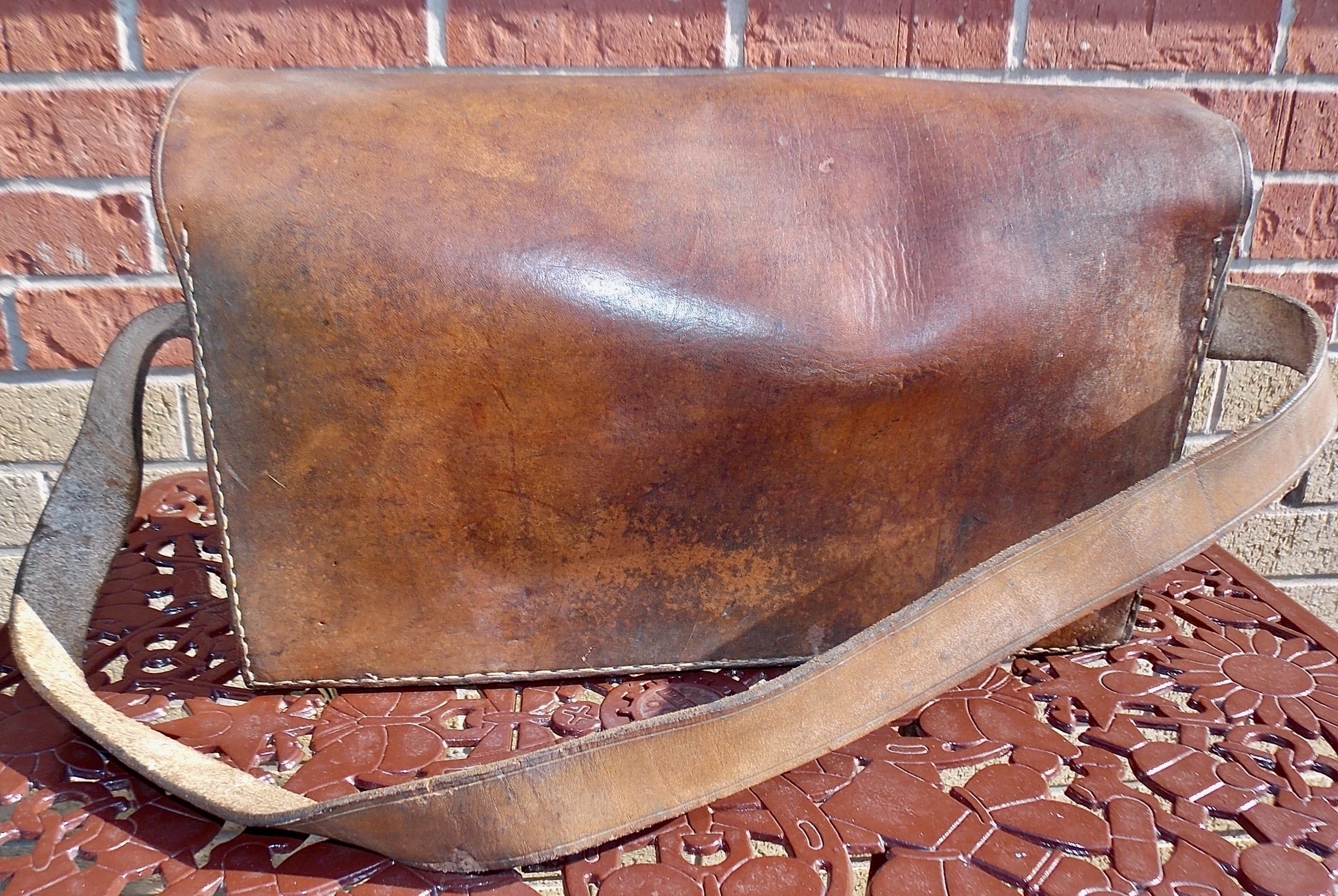 Antique leather store messenger bag